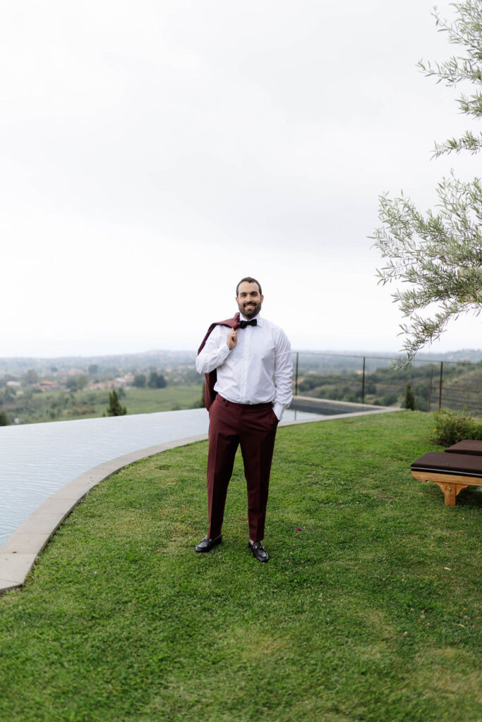 Groom portraits during a Monaci delle Terre Nere wedding celebration