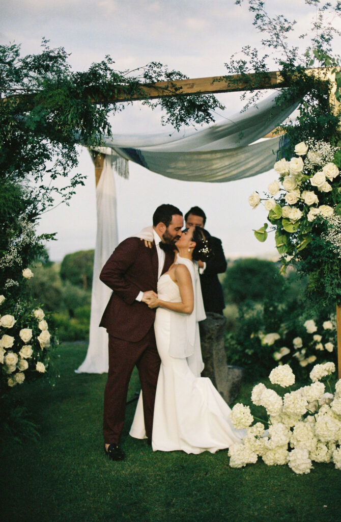 Intimate Monaci delle Terre Nere wedding ceremony set against the Sicilian landscape. 