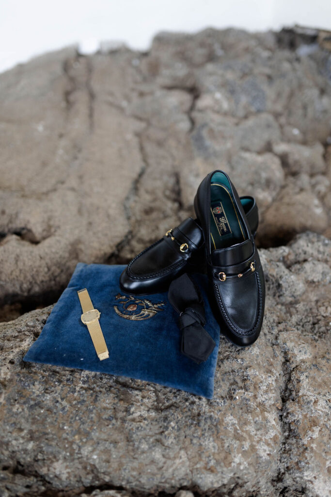 Monaci delle Terre Nere deyail photos showcasing groom's watch, shoes and natural textures. 