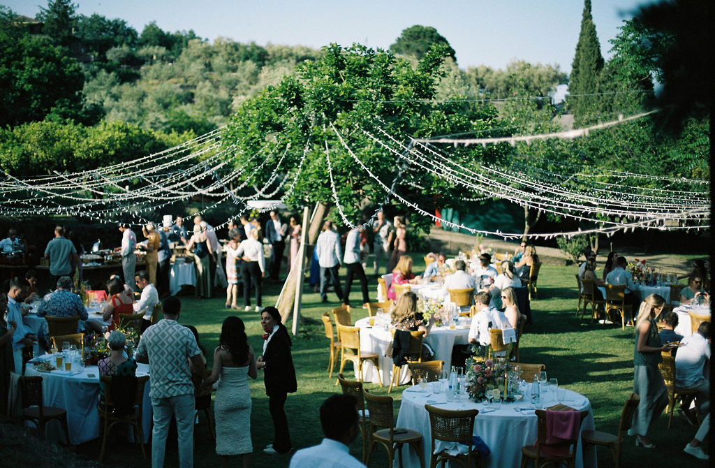 Sicily wedding couple celebrating with guests at Monaci delle Terre Nere. 